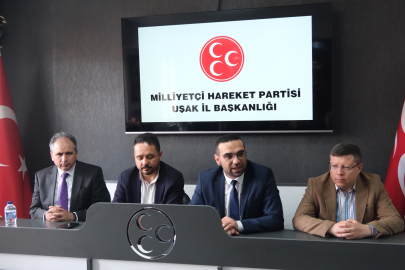 AK PARTİ UŞAK HEYETİ MHP İLE BAYRAMLAŞTI